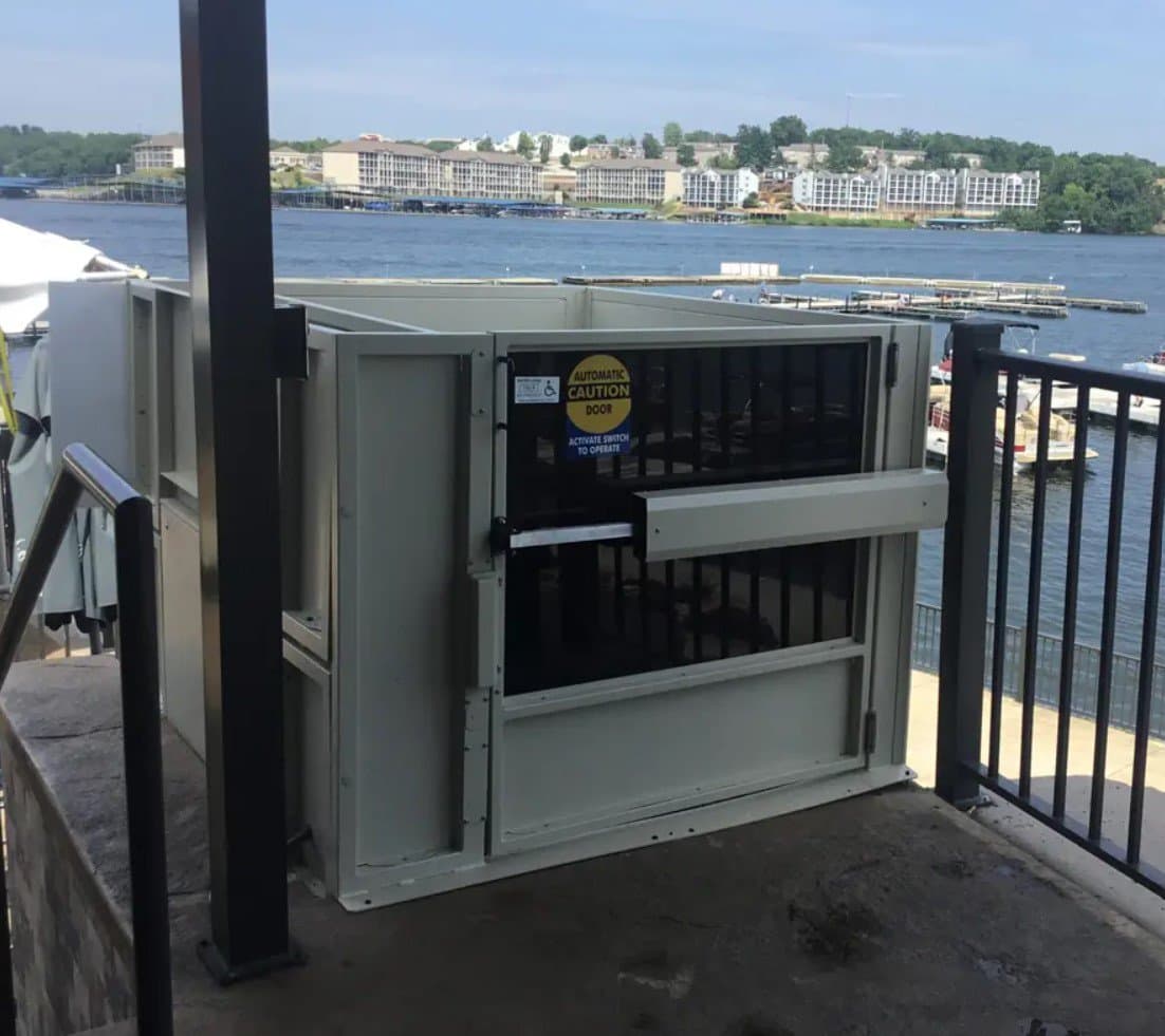 Cibes platform lift exterior installation (placeholder image — Symmetry VPL shown)